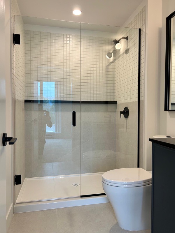 Bathroom with glass shower, freshly sealed
